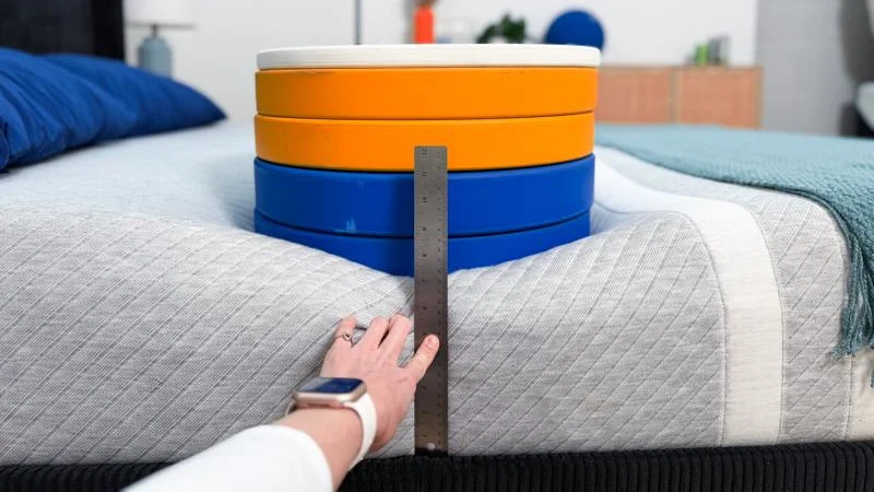 Measuring the deflection of weight plates along the edge of the Leesa Original Mattress