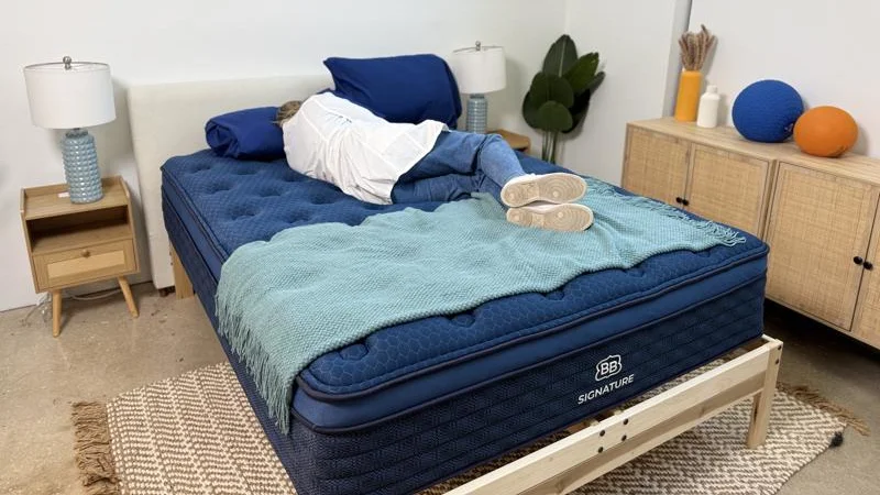 Our tester side sleeping on the Brooklyn Bedding Signature Hybrid Mattress