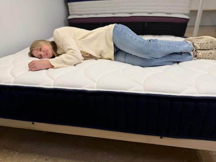 tester side sleeping on dreamcloud classic hybrid mattress4