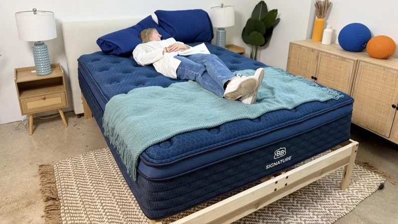 Our tester back-sleeping on the Brooklyn Bedding Signature Hybrid Mattress