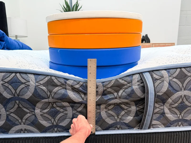5 weight plates on the Serta Perfect Sleeper Cascade Range Medium mattress