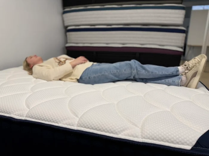 tester back sleeping on dreamcloud classic hybrid mattress3
