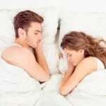 couple side sleeping