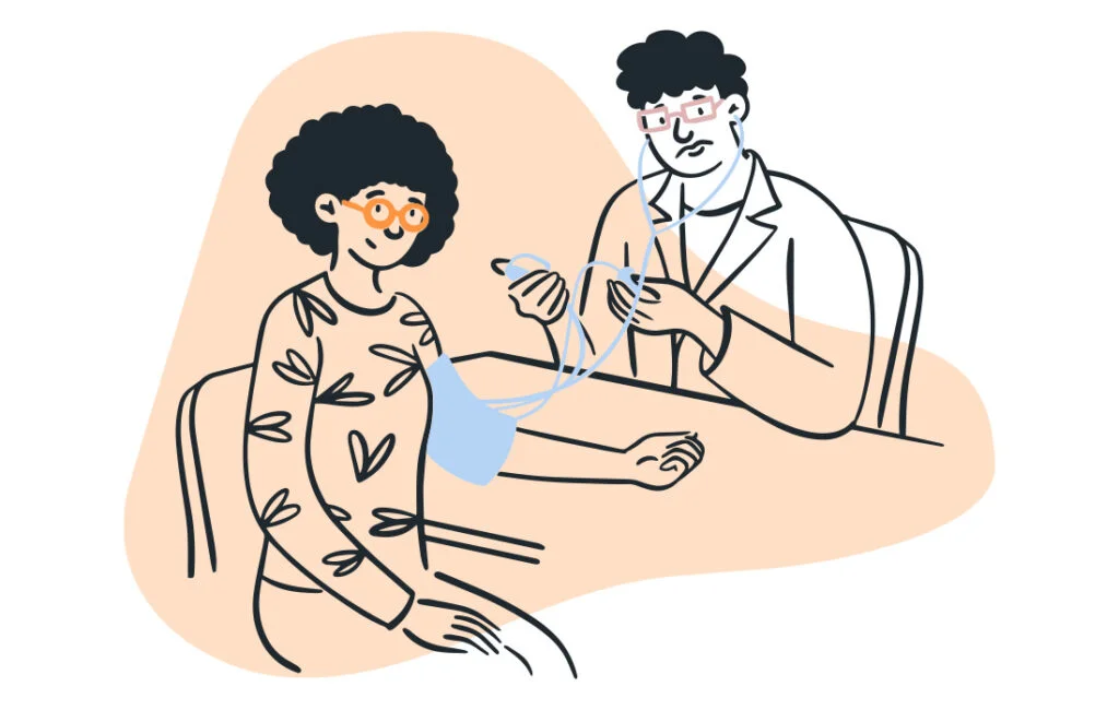 Person sitting with a doctor